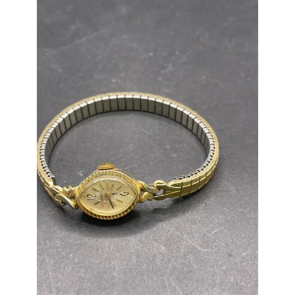 Vintage Timex Watch Women's Gold Tone Round Stretch Band Manual Wind Up 16mm